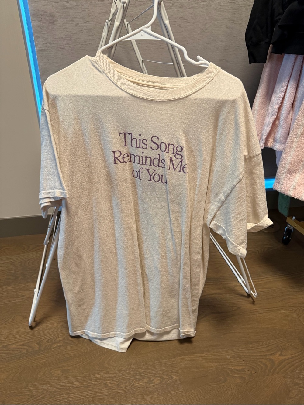LONELY GHOST Cream Tee with Purple Logo